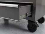 Close-up of the brushed aluminum handle and drawer slide