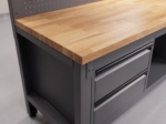 Close-up of the hardwood butcher-block top and drawer handle