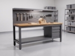 Steel workbench in use with a project on the hardwood top